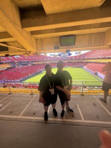 Dan and Ellen The Mission Project and Down Syndrome Innovations employees at FIFA World Cup