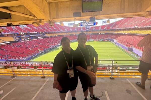 Dan and Ellen The Mission Project and Down Syndrome Innovations employees at FIFA World Cup